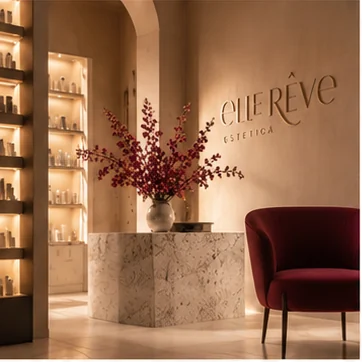La reception del centro con il logo Elle Rêve a parete